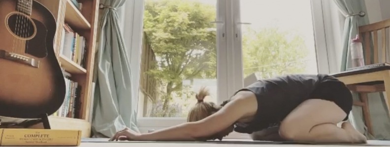 Photograph of a lady doing yoga