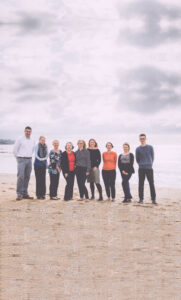 Photograph of the Harland team on the beach